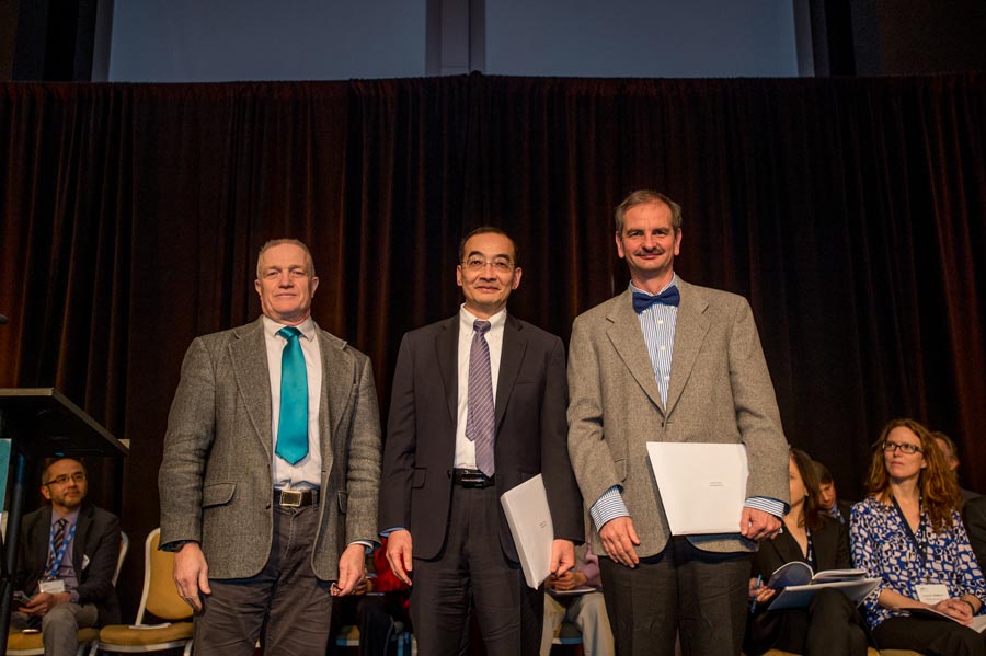 László Erdős (right), Horng-Tzer Yau of Harvard University (center), and AMS President Robert Bryant (left) (© Kate Awtrey, Atlanta Convention Photography)