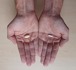 Illustration of hands with pills