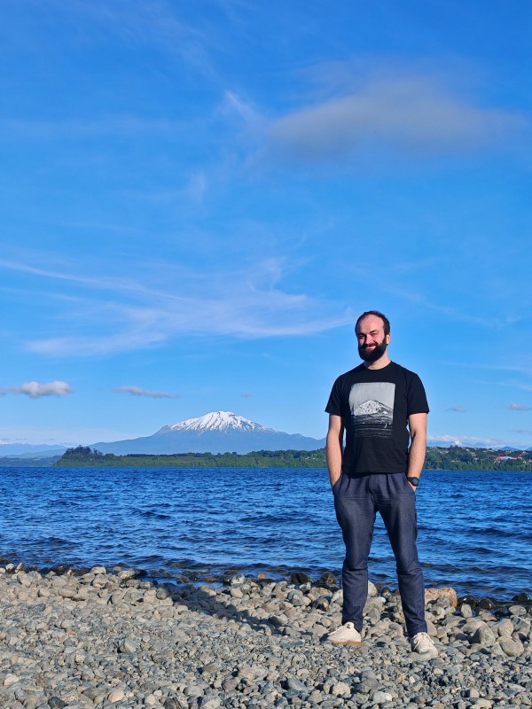 Galien Grosjean in front of Calbuco, a volcano in Chile famous for volcanic lightning.