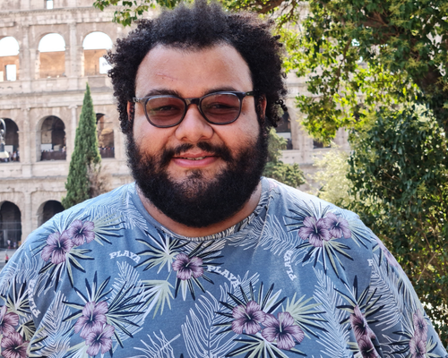 Portrait of Walner Mendonca smiling